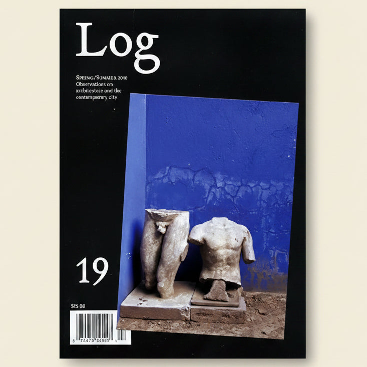 Magazine cover titled 'Log' with stone sculptures against a blue background
