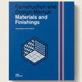 Book cover of 'Materials and Finishings' from a construction and design manual with a blue background and geometric design.