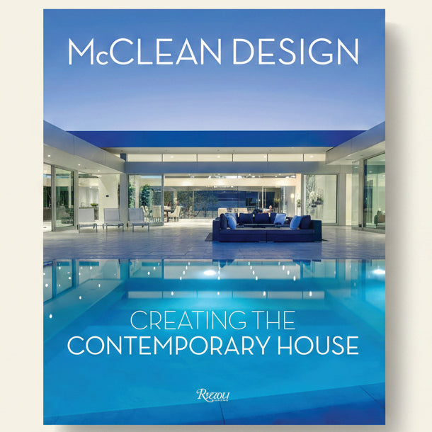 Book cover of 'Creating the Contemporary House' by McClean Design with a modern house and pool in the background.