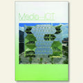 Book cover with a green building and 'Media-ICT' text on a white background
