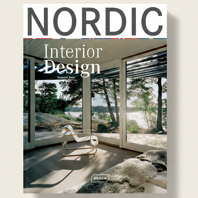 Book cover of 'Nordic Interior Design' with a modern interior design scene.