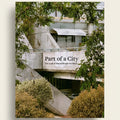 Modern architectural building with 'Part of a City' text overlay, surrounded by greenery.