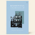 Book cover of 'Residential Construction Law' with a house illustration on a light blue background