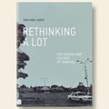 Book cover of 'Rethinking a Lot: The Design and Culture of Parking' by Eran Ben-Joseph with images of cars and a parking lot.