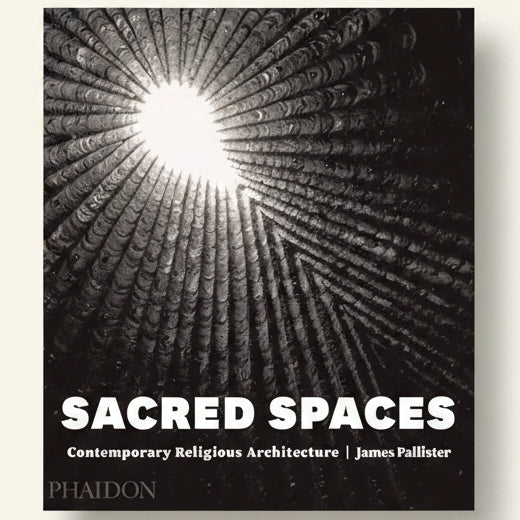 Book cover of 'Sacred Spaces' with a black and white photo of a sunburst pattern.