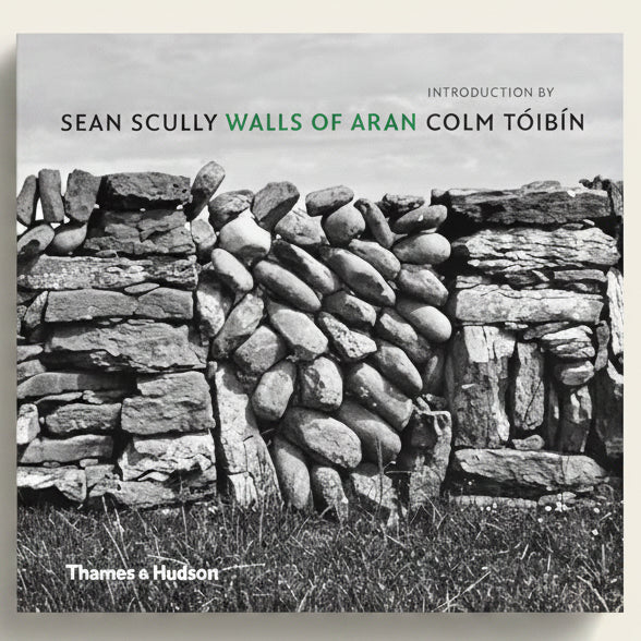Book cover of 'Walls of Aran' with stone wall design and publisher's name.