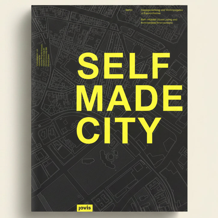 Book cover of 'Self Made City' with yellow text on a black background