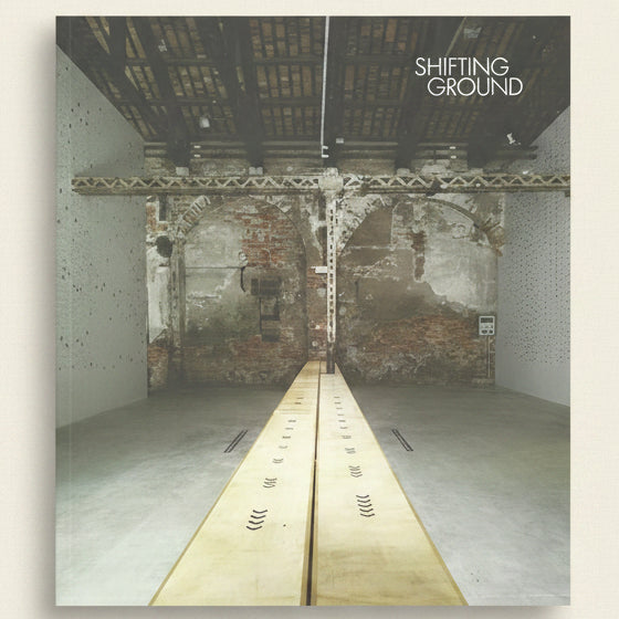 Album cover with a split image of a room and a hallway, titled 'Shifting Ground'.