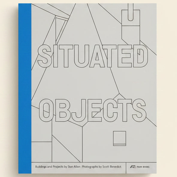 Book cover with geometric shapes and text 'SITUADED OBJECTS' on a blue and gray background