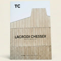 Magazine cover with wooden architectural structure and 'TC' branding