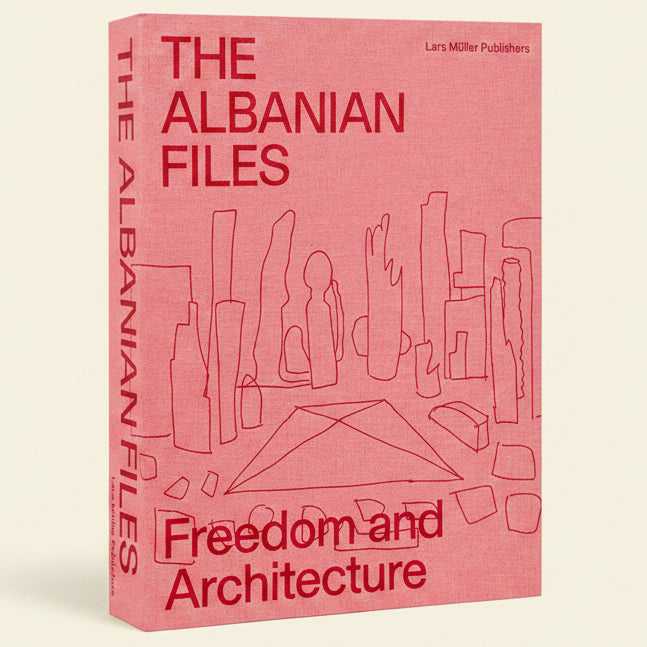 The front and spine of the book 'The Albanian Files: Freedom and Architecture' by Lars Müller Publishers, featuring a salmon pink textured cover with red typography and minimalist architectural line drawings.