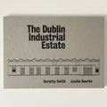A square book cover for 'The Dublin Industrial Estate' by Dorothy Smith and Jackie Bourke, featuring a minimalist black line drawing of a building on a textured light gray background.