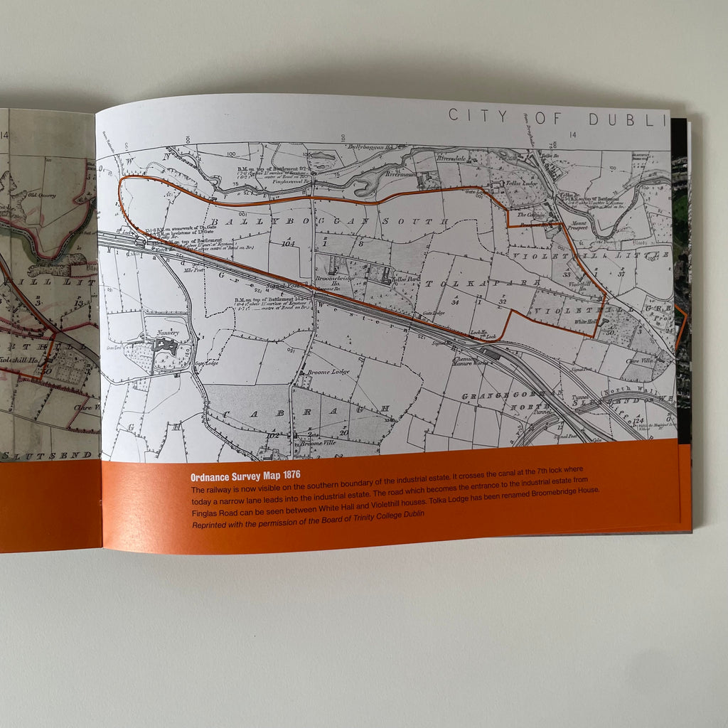 An open vintage map booklet or guide showing a map labeled City of Dublin with a highlighted route in brown, photographed against a light neutral background.