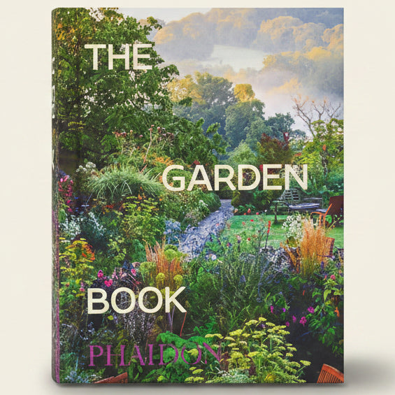 Book cover of 'The Garden Book' by Phaidon with a scenic garden image.