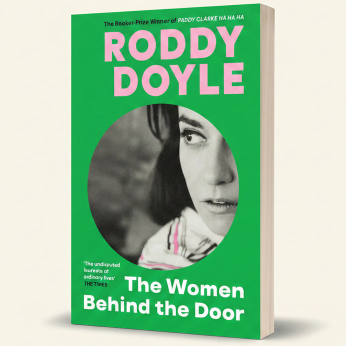 Book cover of 'The Women Behind the Door' by Roddy Doyle with a green background and circular portrait of a woman.