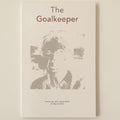 Book titled 'The Goalkeeper' with a portrait on the cover against a plain background