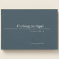 Book titled 'Thinking on Paper' by James Horan with a blue cover.