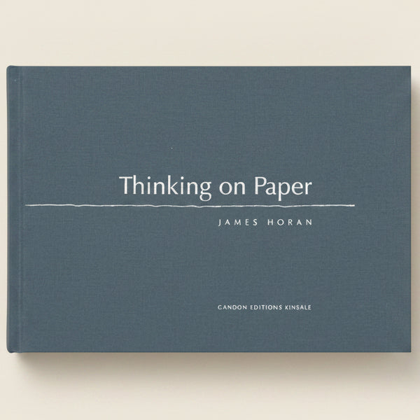 Book titled 'Thinking on Paper' by James Horan with a blue cover.