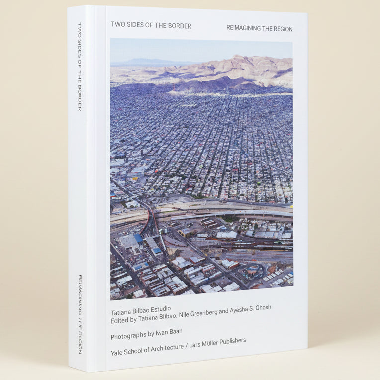 Book cover of 'Two Sides of the Border' with an aerial view of a city and desert landscape.