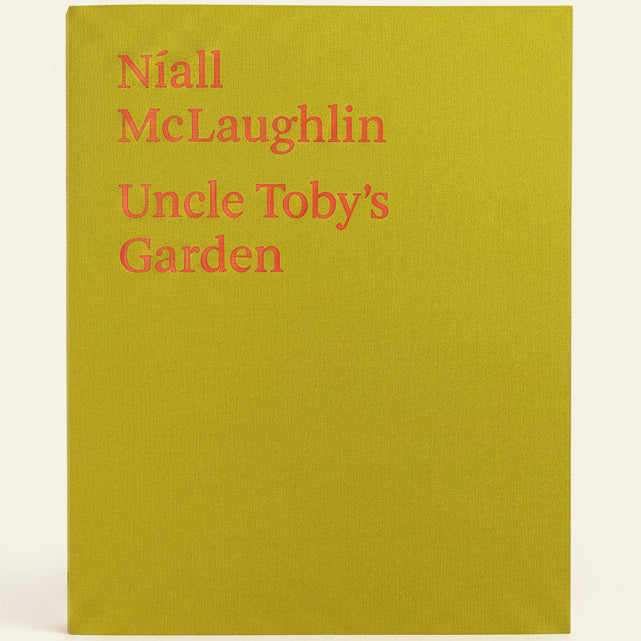 Book cover with yellow background and red text displaying 'Niall McLaughlin Uncle Toby's Garden'.
