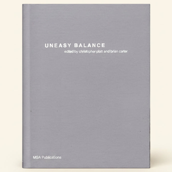 Book cover of 'Uneasy Balance' edited by Christopher Platt and Brian Carter with a gray background.