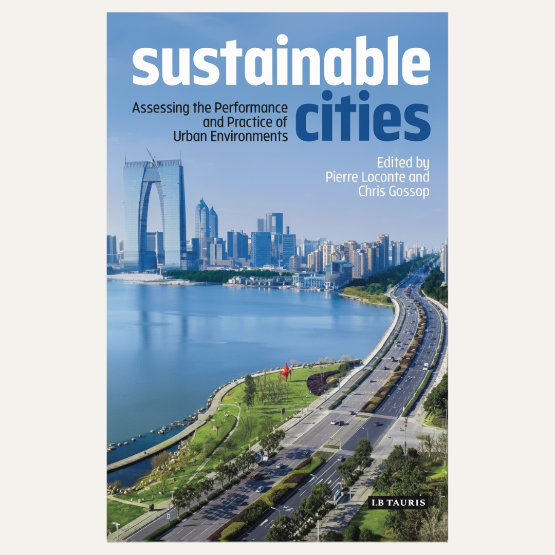 Book cover for 'sustainable cities: Assessing the Performance and Practice of Urban Environments', edited by Pierre Loconte and Chris Gossop, published by LB Tauris. The cover features a photograph of a modern coastal city with a highway running alongside a body of water under a blue sky.