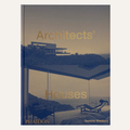 The front cover of the book 'Architects' Houses' by Dominic Bradbury, published by Phaidon. The cover features a sepia-toned photograph of a modern house on a cliffside overlooking a pool and lounge chairs, with the title in gold lettering.