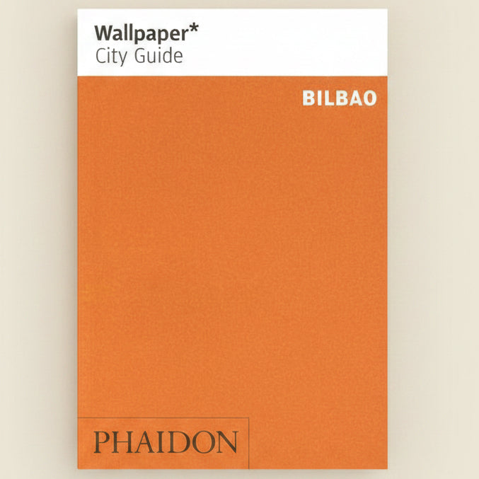 Orange book cover with 'Wallpaper* City Guide Bilbao' and 'Phaidon' branding.