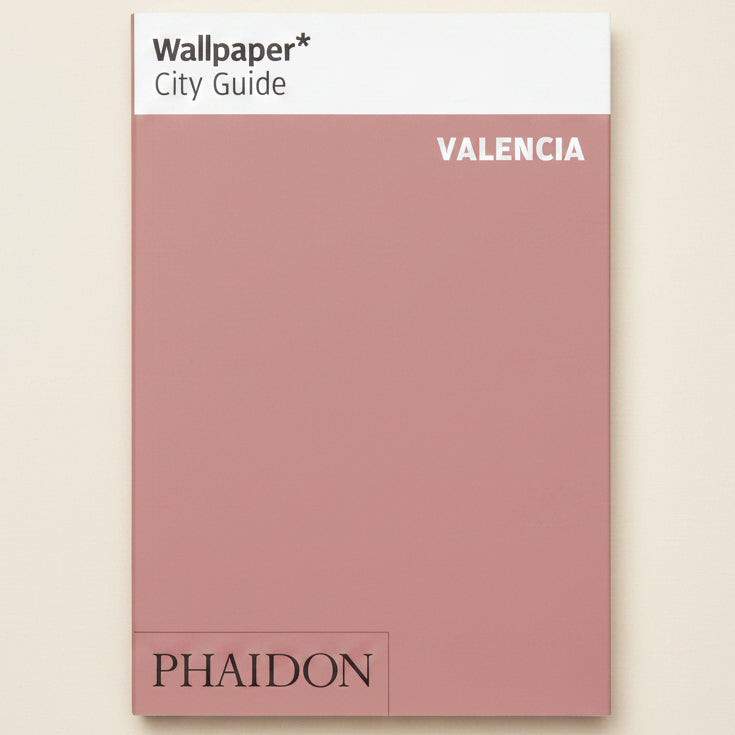 Wallpaper* City Guide Valencia by Phaidon on a pink background