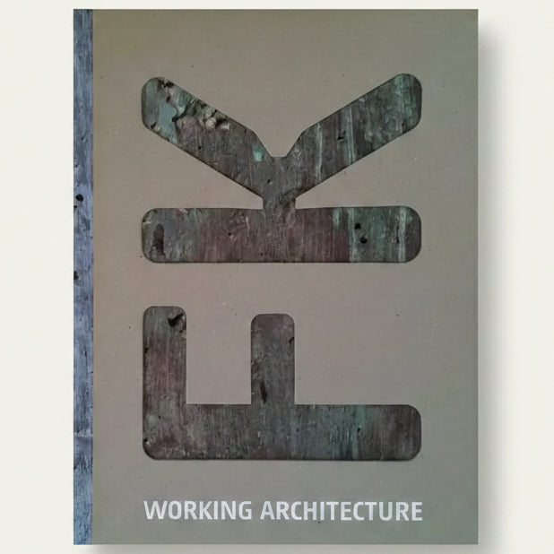 Metallic logo with 'Working Architecture' text on a beige background
