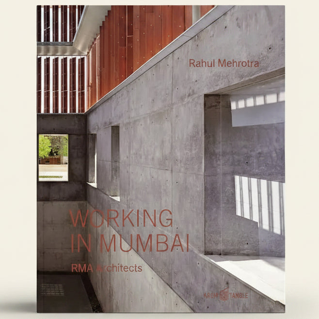 Book cover of 'Working in Mumbai' by Rahul Mehrotra featuring architectural design.