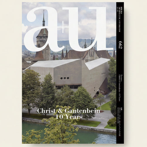 Cover of a magazine featuring a modern building with trees and water in the foreground, and 'au' branding.